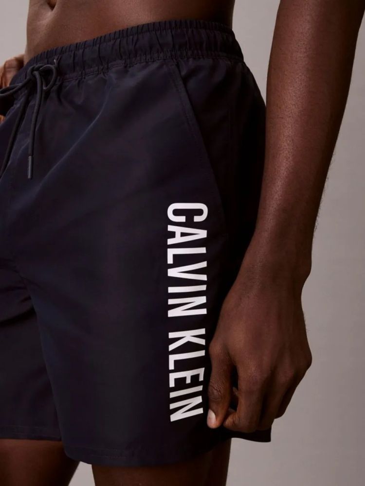 ΜΑΓΙΟ CALVIN KLEIN MEDIUM DRAWSTRING BLUE CALVIN KLEIN φωτογραφία