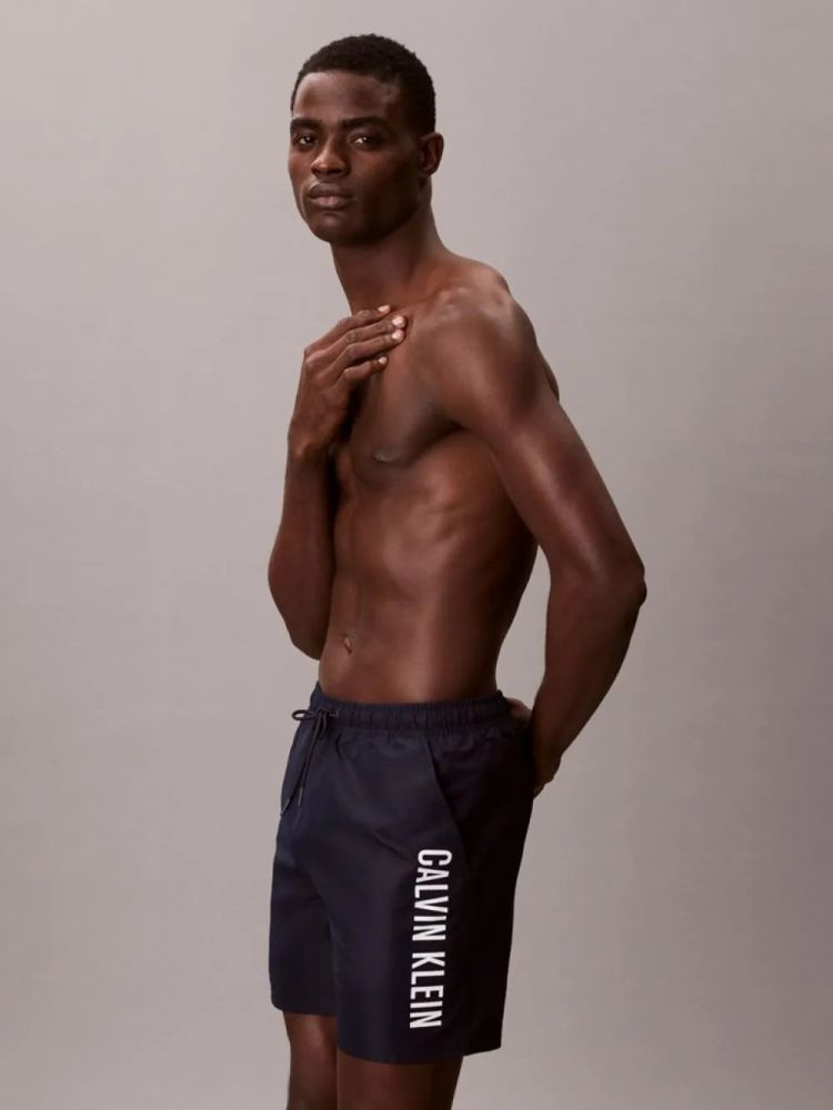 ΜΑΓΙΟ CALVIN KLEIN MEDIUM DRAWSTRING BLUE CALVIN KLEIN φωτογραφία