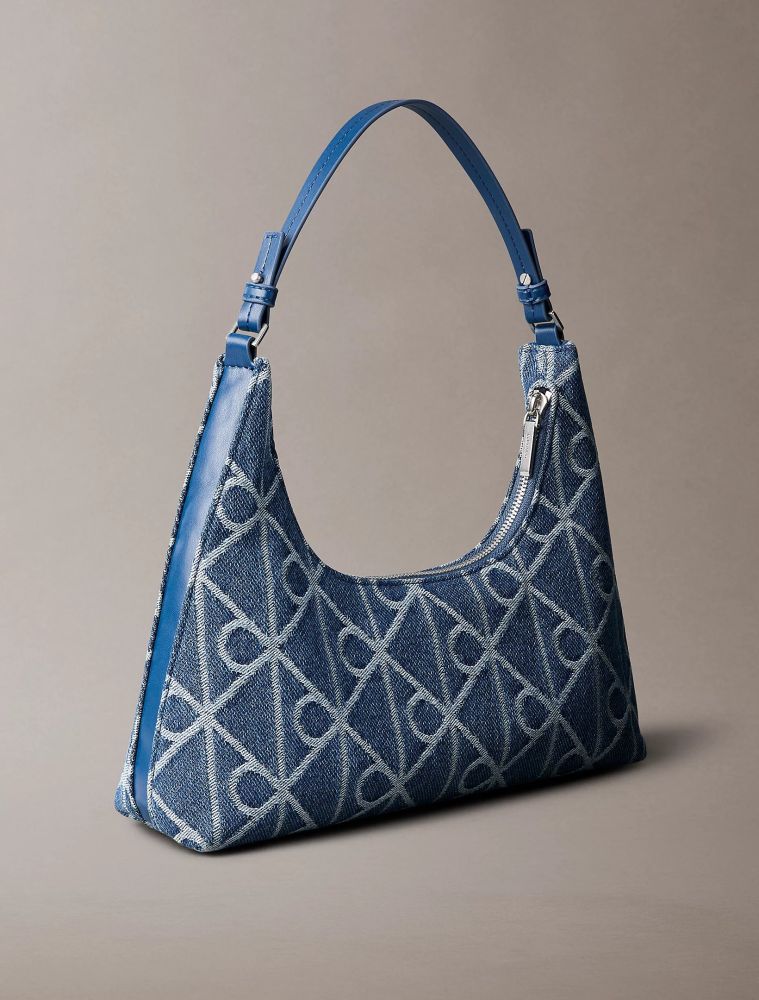 ΤΣΑΝΤΑ CALVIN KLEIN EMBLE AOP DENIM SHOULDER BLUE CALVIN KLEIN φωτογραφία