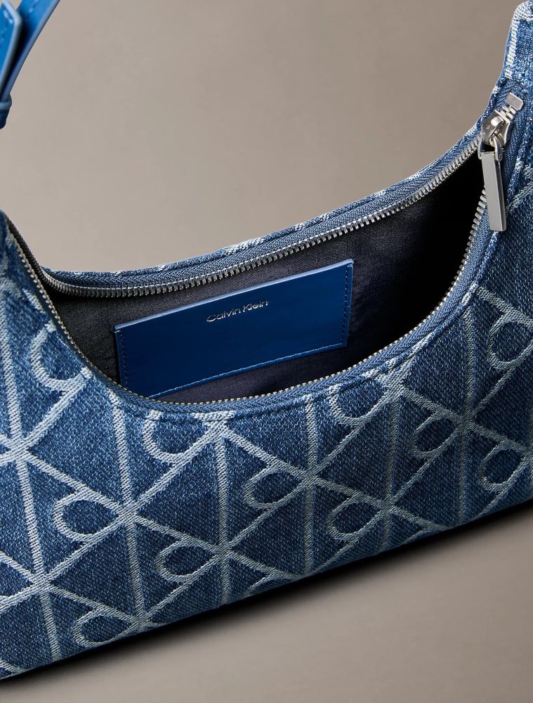 ΤΣΑΝΤΑ CALVIN KLEIN EMBLE AOP DENIM SHOULDER BLUE CALVIN KLEIN φωτογραφία