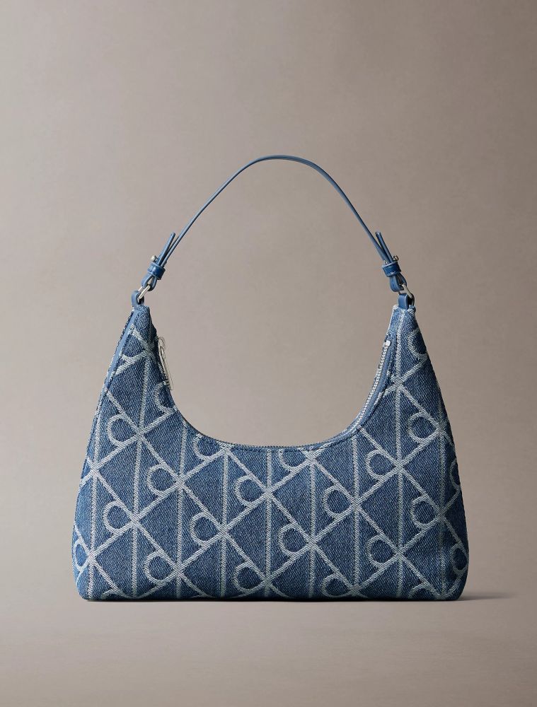 ΤΣΑΝΤΑ CALVIN KLEIN EMBLE AOP DENIM SHOULDER BLUE CALVIN KLEIN φωτογραφία